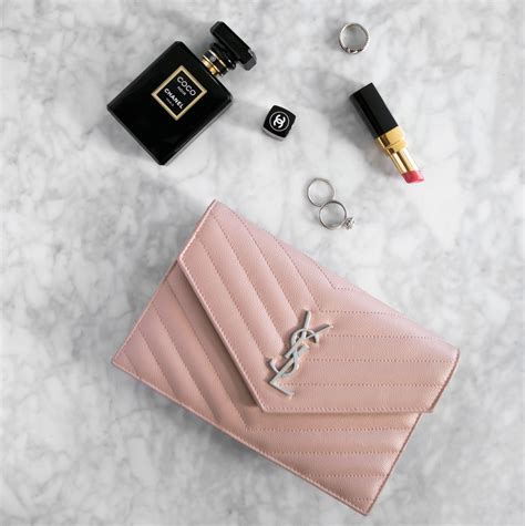 ysl woc gold or silver|ysl monogramed wallet.